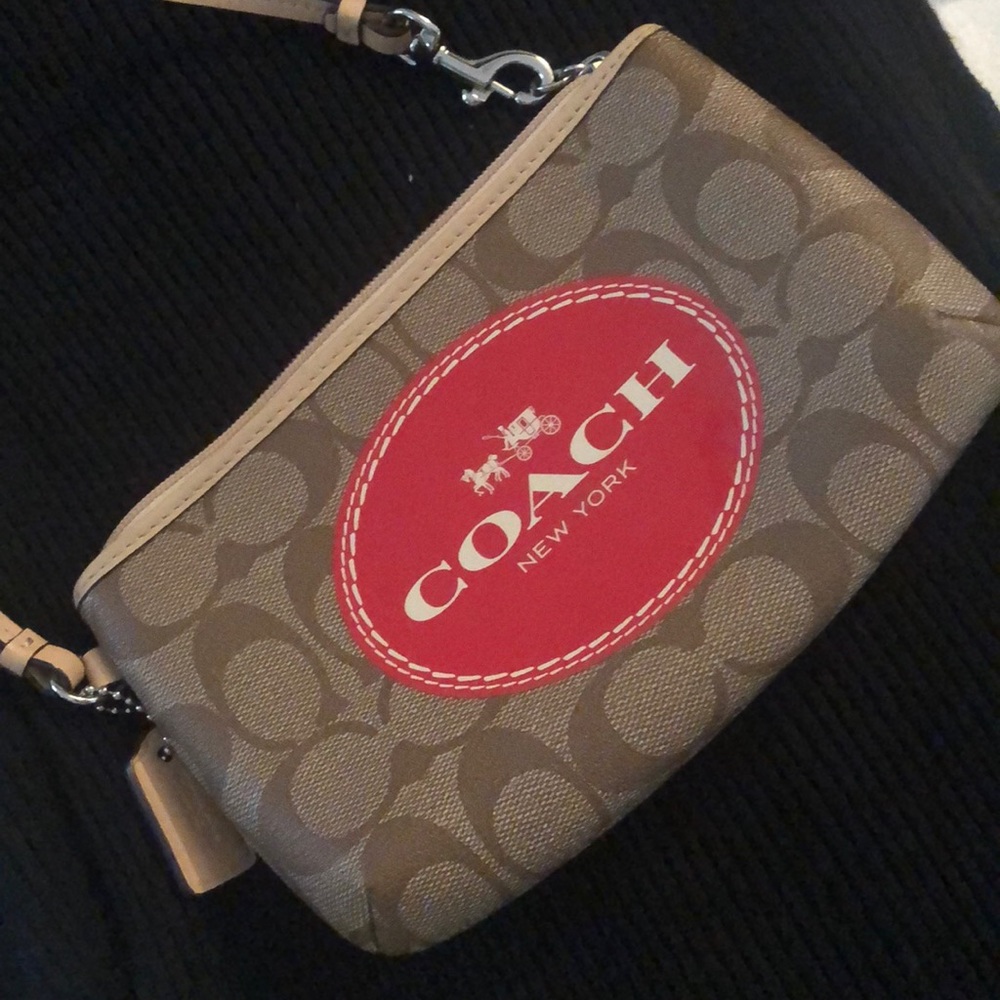 NEW /Never used Coach clutch